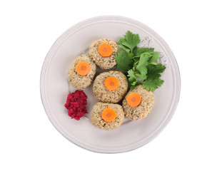 Plate of traditional Passover (Pesach) gefilte fish isolated on white, top view