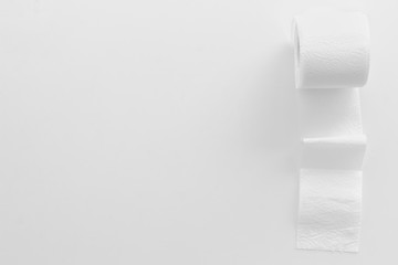 Toilet paper roll on white background top view copy space