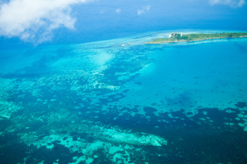Fototapeta na wymiar view of tropical island in the ocean from drone