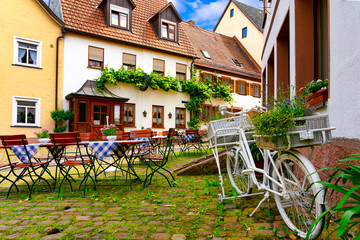 Narrow street in the old town of Amorbach in Lower Franconia, Bavaria, Germany