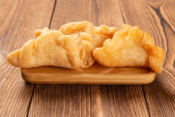 side view sweet fried dumplings like flowers for Chinese New Year