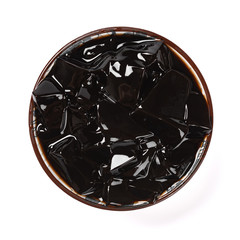 top view bowl of Licorice black jelly on white clipping path