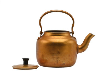 Golden metal kettle on a white background.Teapot.