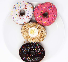 colorful smile face donuts on a plate
