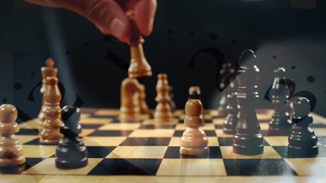 Clock and a man playing chess