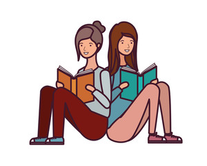 women sitting with book in hands