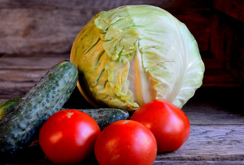 Vegetables from the garden in the village, tomatoes, cucumbers, cabbage, onions.