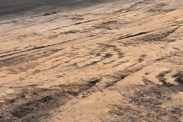 Construction pavement with many wheel prints