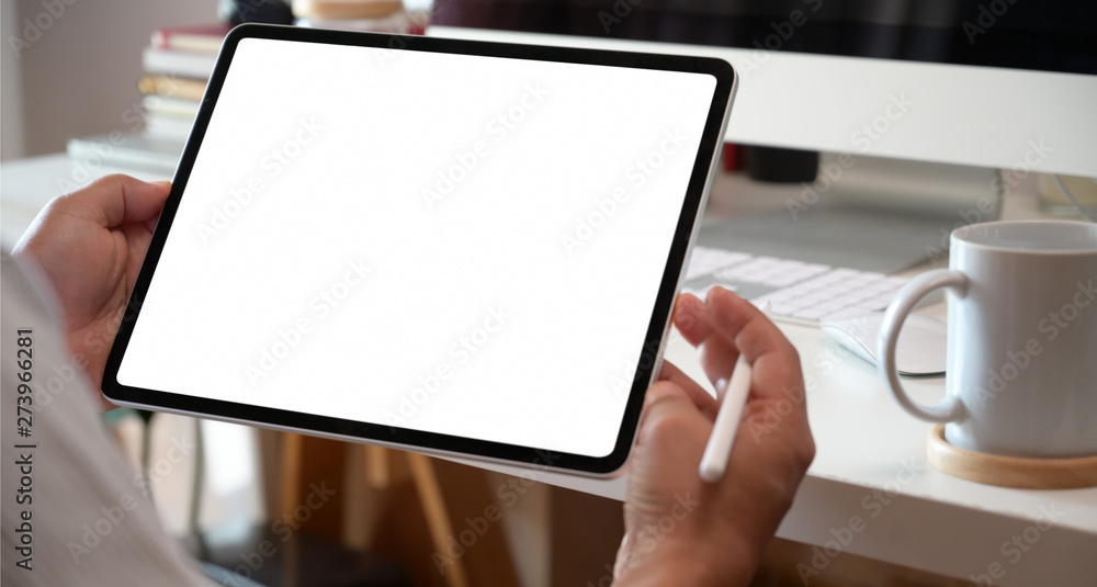 Poster businessman using digital tablet mock up blank screen display