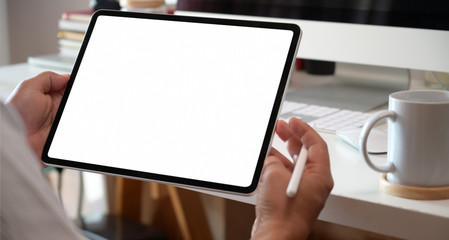 Businessman using digital tablet mock up blank screen display