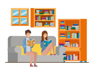 couple with book in hands in living room