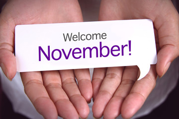 Hand showing welcome November.