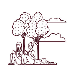 women sitting with book in landscape with trees and plants