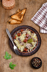 Stewed vegetables with sausages