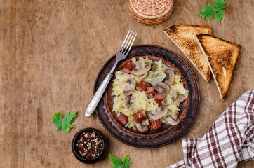 Stewed vegetables with sausages