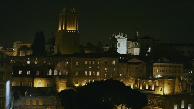 A panoramic zoom in on Trajan's Market on the Via dei Fori Imperiali from Vittoriano Monument, in Rome, Italy. Shot on Red Monstro 8K. In 4K
