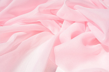 Texture chiffon fabric pink color for backgrounds