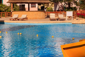 Swimming pool with clear water at a tropical resort