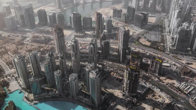 Aerial view Dubai city skyscrapers a modern metropolis architectural wonder, time lapse, Dubai, UAE