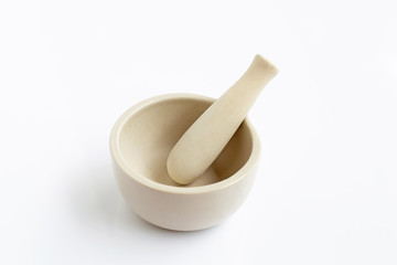 Mortar and pestle on white