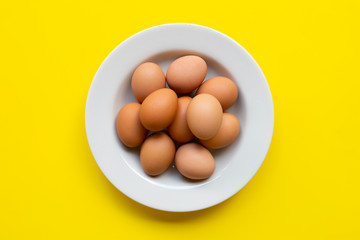 Eggs on yellow background.