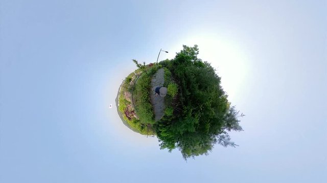 Ansan, South Korea - 12 June 2019 Artificial waterfall and Fountains in Ansan Nojeokbong Park edited by Gopro Fusion 360 Little Planet view.