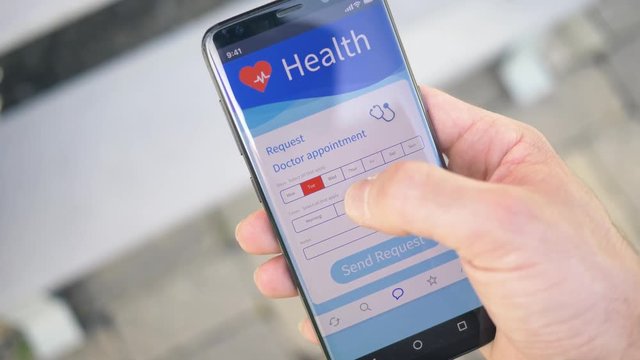 Using An Online Appointment App To Schedule A Rendezvous To The Doctor On A Smartphone Screen.