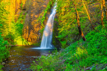 Fototapeta na wymiar Colorful Sunset at Horsethief Falls on Columbia Gorge in Portland, Oregon