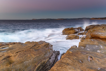Fototapeta na wymiar Sunrise Seascape from the Headland with Clear Skies