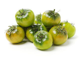 fresh green tomato isolated on white background