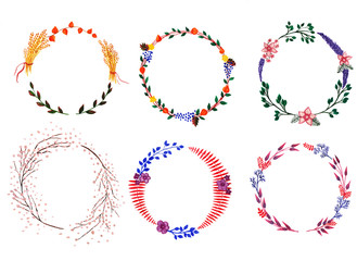 Watercolor multicolored wreaths hand drawn on white background
