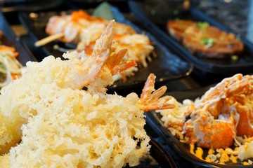 Japanese food style, Selective focus of ebi tempura on blurred background in restaurant, Ready to eat or serve, Soft focus, dark background