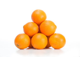 Oranges arranged in a pyramid