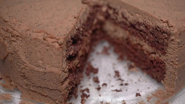 Closeup of a delicious chocolate layer cake that was cut