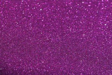 blur glitter, bokeh, defocused violet purple  festive background,  texture. Xmas abstract background .