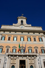 Fototapeta na wymiar Palazzo Montecitorio is a palace in Rome and the seat of the Italian Chamber of Deputies.