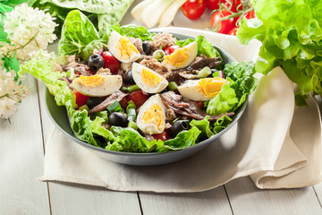 Nicoise Salad with tuna, anchovy, eggs and tomatoes