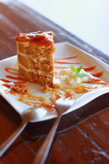 Piece of chocolate cake on a white plate
