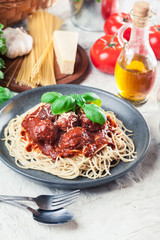 Spaghetti pasta with meatballs and tomato sauce