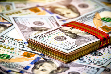      a pack of lies the US currency on background of dollars 