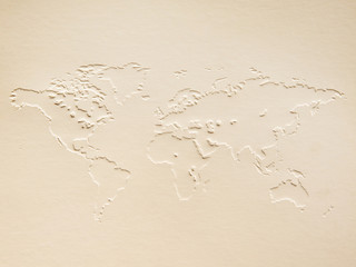 a world map made of embossing paper