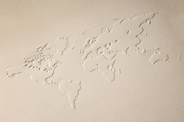 a world map made of embossing paper