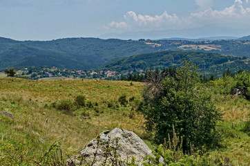 Fototapeta premium View of summer glade, forest and residential district of bulgarian village, Vitosha mountain, Bulgaria 