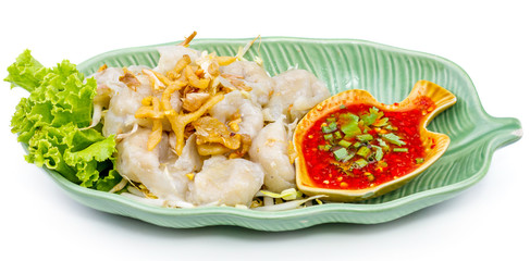 Fish dumpling with sauce on white plate, Thai food in thailand isolated over white background.