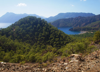 Mountain southern summer landscape. View of the green hills and cliffs.