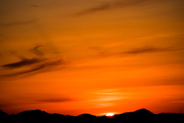 The sun drop behind the mountain nearly