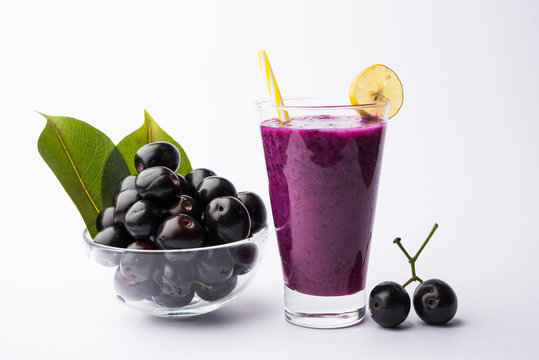 Juice of jamun fruit in a glass also called as java plum, jambolan plum, jambhul, syzygium cumini
