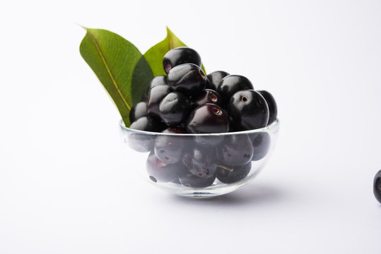 Juice of jamun fruit in a glass also called as java plum, jambolan plum, jambhul, syzygium cumini