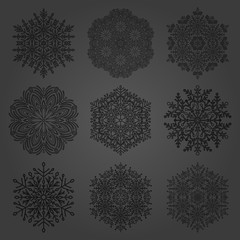 Set of vector snowflakes. Dark winter ornaments. Snowflakes collection. Snowflakes for backgrounds and designs