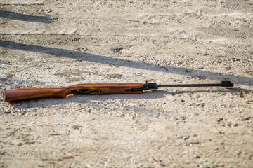 air rifle lying on the ground
